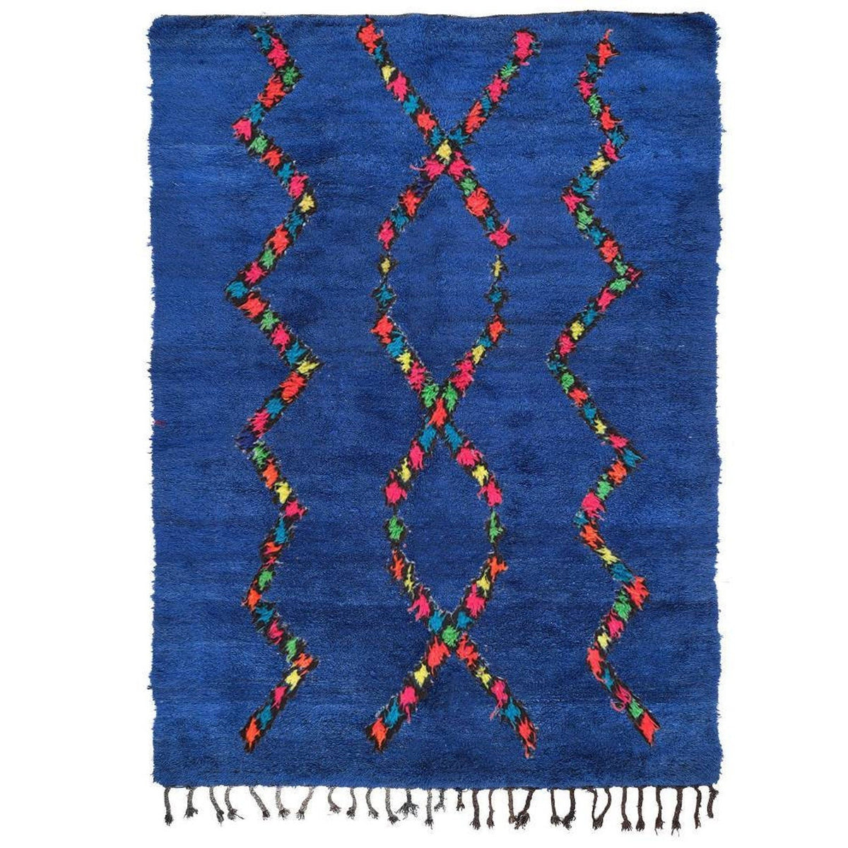 Front view of a blue Moroccan rug featuring an abstract Berber design with fringed edges.