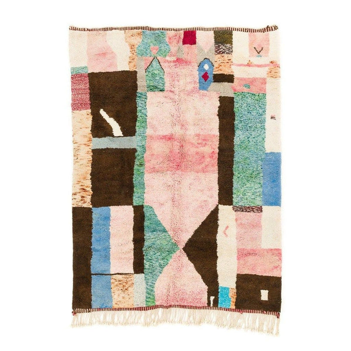 Front view of a colorful Moroccan rug featuring patchwork design in pink, brown, blue, and green.