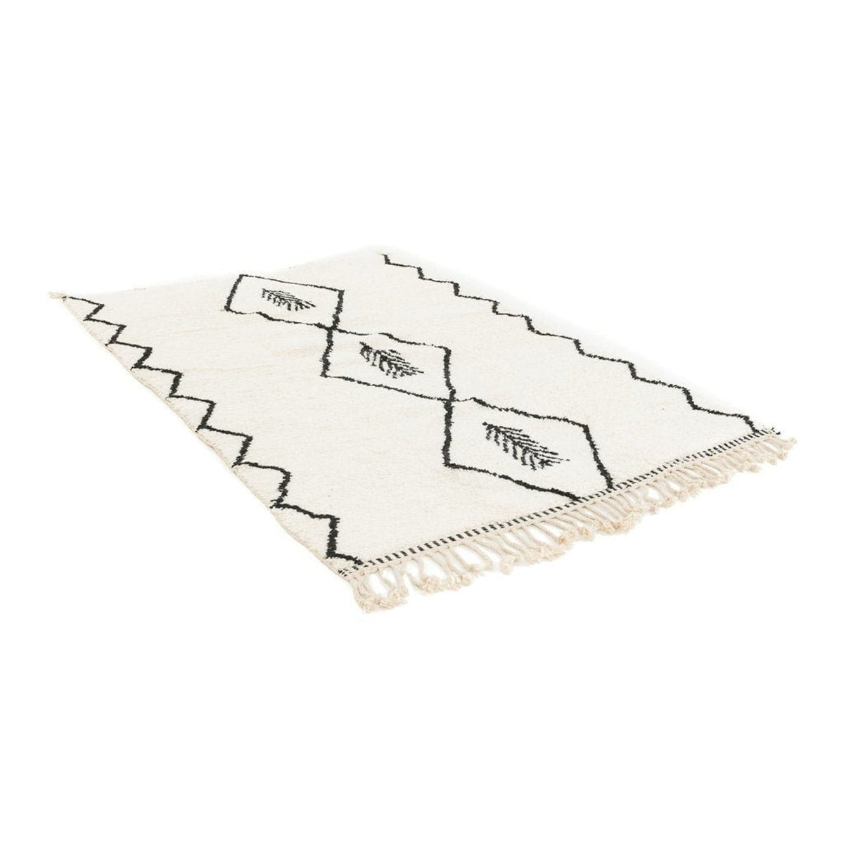 Side view of the Moroccan rug with a zigzag pattern and fringe edges.