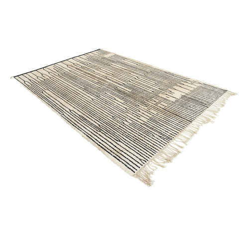 Front view showcasing a black and white geometric pattern on a contemporary Moroccan rug.