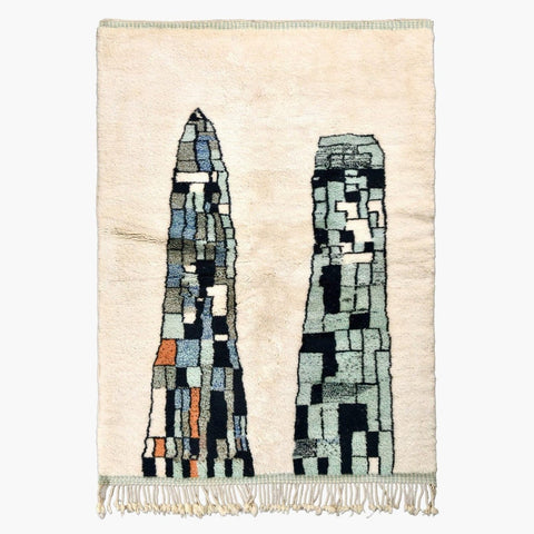 Front view of the abstract area rug featuring geometric patterns in beige, blue, and orange.