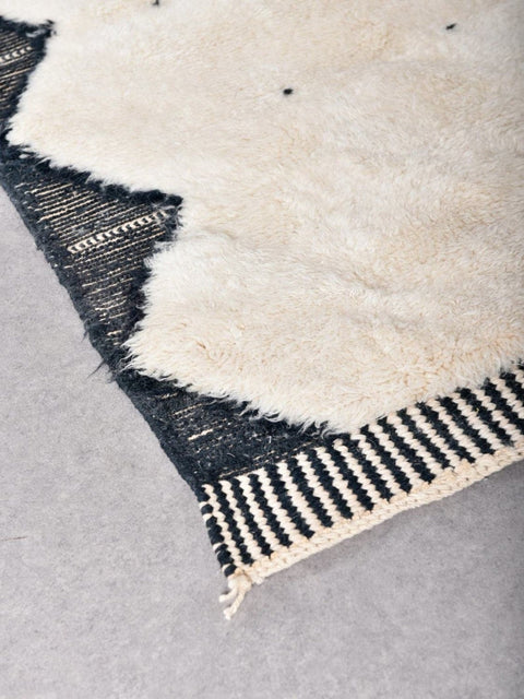 Close-up detail highlighting the detailed pattern and soft fibers of the rug.