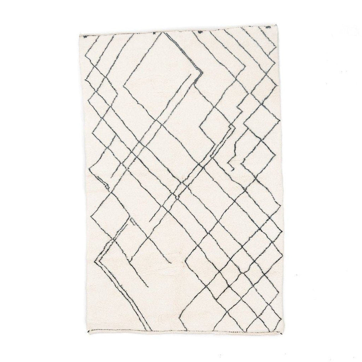Front view of the geometric white area rug featuring a geometric pattern.