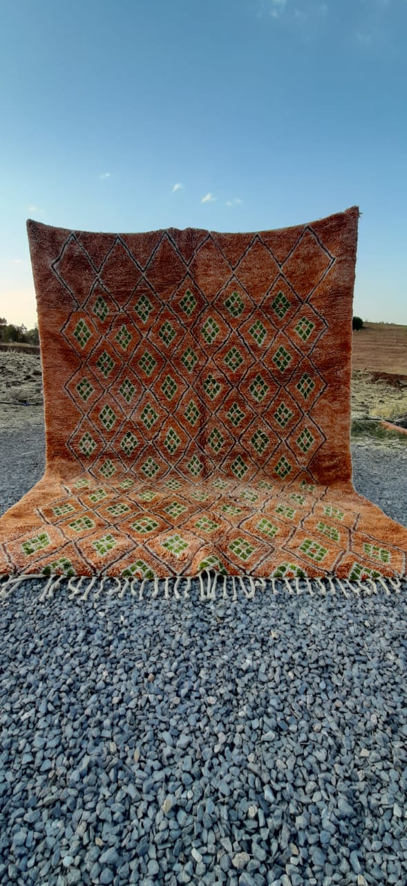 Front view of the Earth-Tone Abstract Beni Ourain rug showcasing geometric patterns in orange and brown.