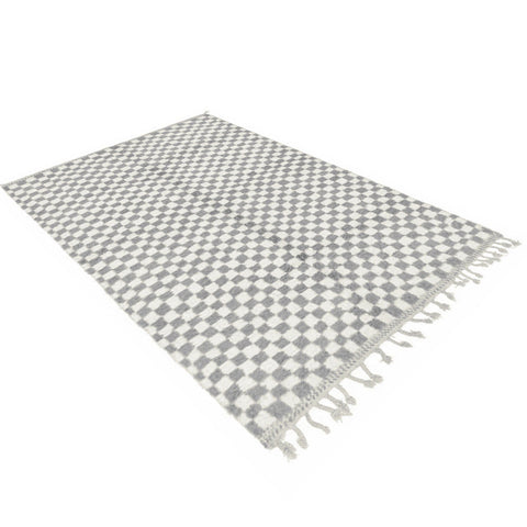 Front view of the gray checkered Moroccan rug featuring fringed edges against a white background.
