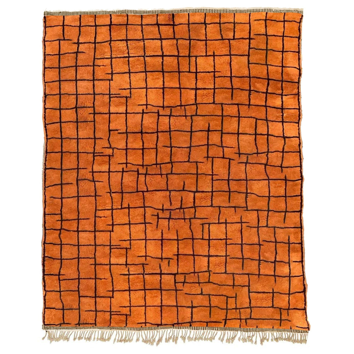 Detail close-up of the orange berber rug showcasing the grid pattern against a white background.