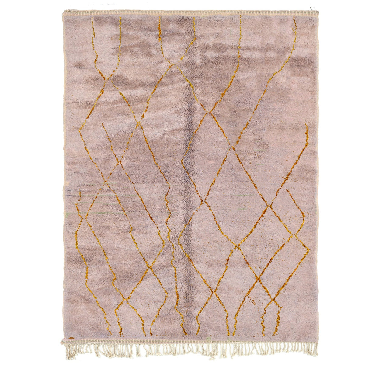 Front view of the lavender and gold geometric rug with fringe edges on a white background.