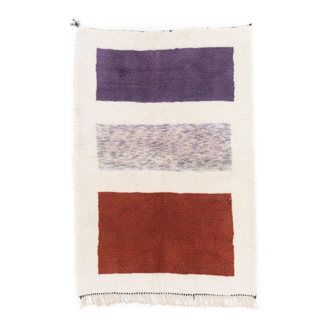Front view of the cream and burgundy color block Moroccan rug with geometric pattern.