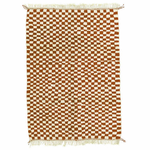 Front view of the beige checkered Moroccan rug with brown and white patterns.