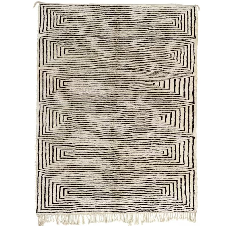 Front view of the striped maze rug showcasing its beige and white pattern.