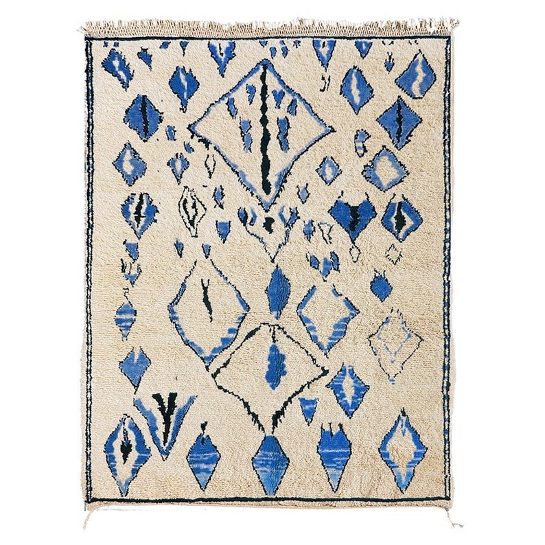 Front view of a blue Berber rug featuring geometric patterns and fringe edges.