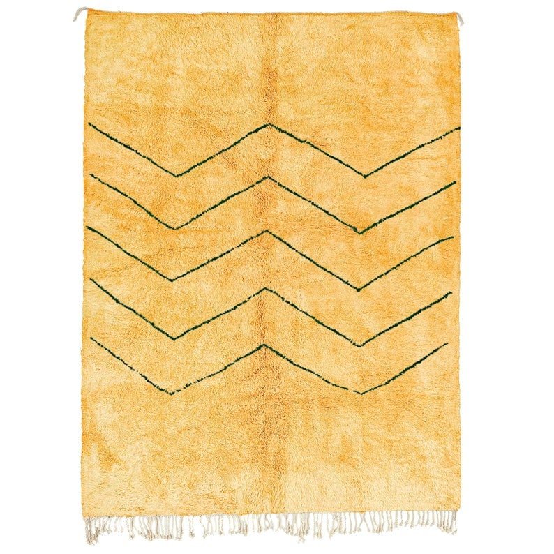 Front view of the golden yellow Beni Ourain rug featuring a zigzag pattern on a white background.