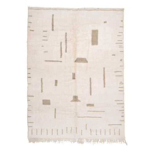 Front view of an off-white gray Moroccan rug featuring a geometric design and fringe edges.