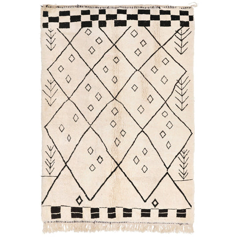 Front view of the cream dotted border Moroccan rug featuring a diamond pattern in beige and black.