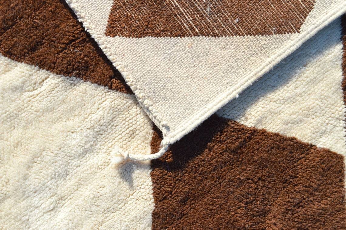 Detailed view showcasing the textured surface of the brown diamond Moroccan rug.