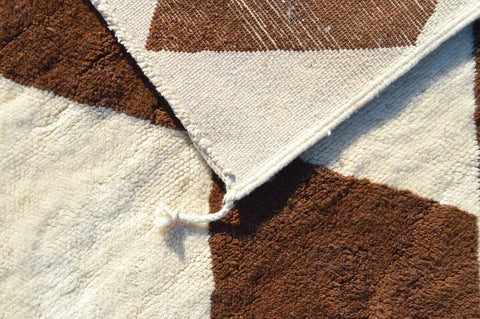 Detailed view showcasing the textured surface of the brown diamond Moroccan rug.