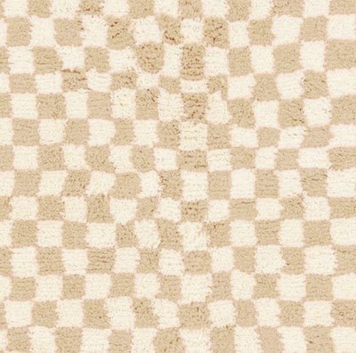 Detail close-up showcasing the abstract design of the beige checkered Moroccan rug.