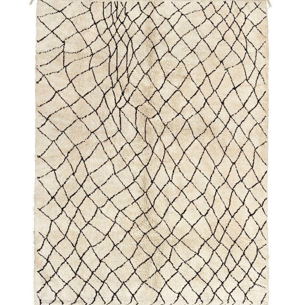 Front view of the beige striped Beni Ourain Moroccan rug showcasing its abstract design.