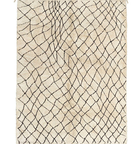 Front view of the beige striped Beni Ourain Moroccan rug highlighting its unique abstract pattern.