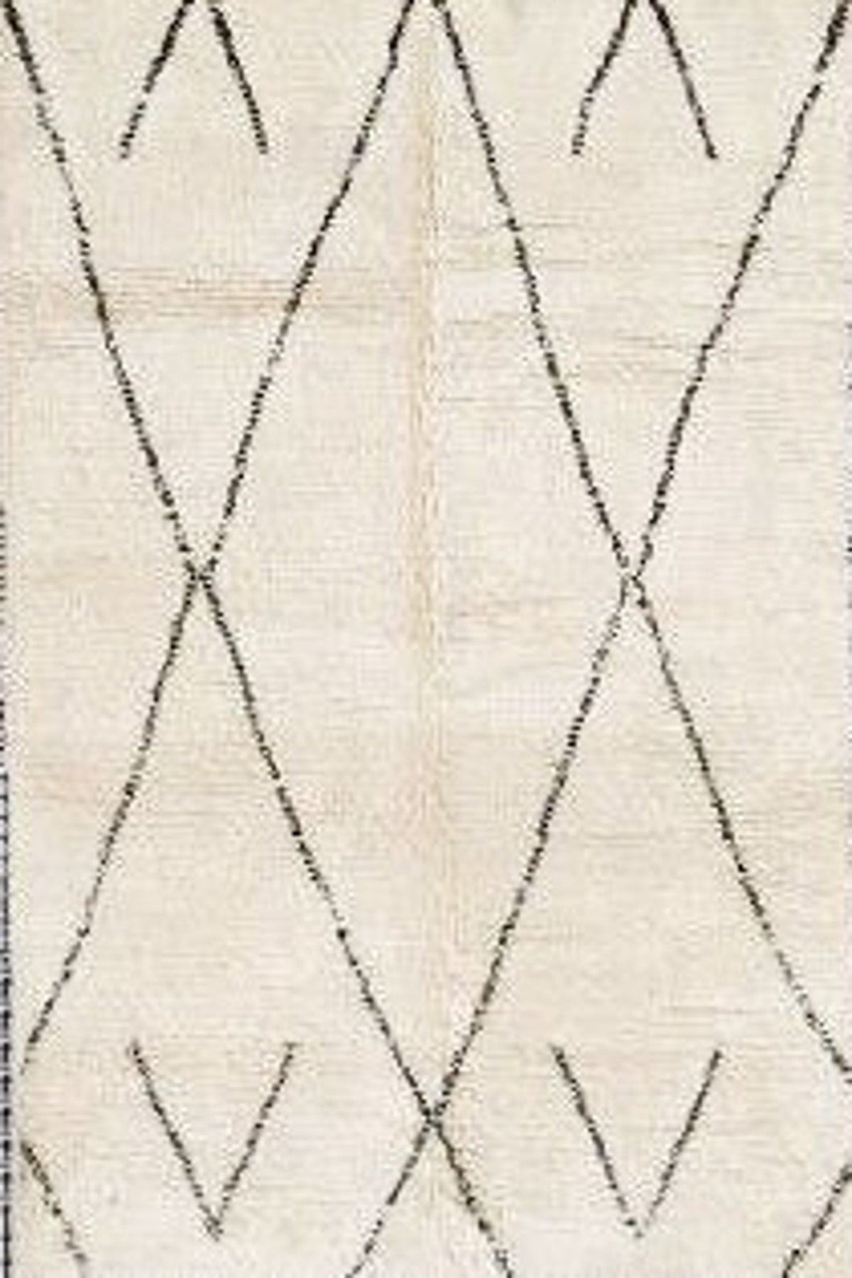Close-up detail of the light gray diamond lattice Moroccan rug showing the geometric pattern.