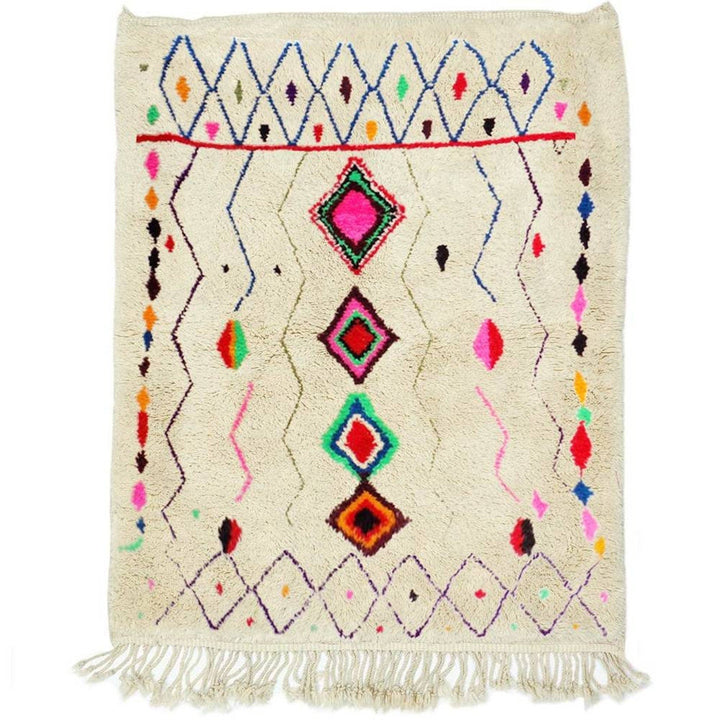 Front view of a colorful tribal rug featuring geometric patterns and fringe edges.