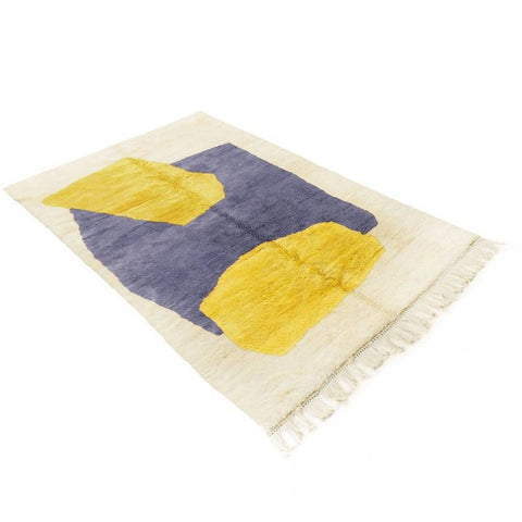 Front view of the mustard abstract Moroccan rug featuring a geometric design in yellow and cream.