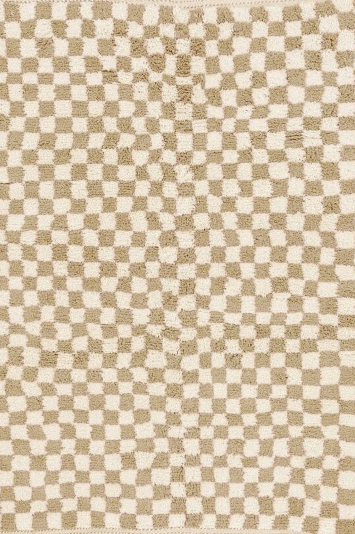 Close-up detail of the beige and white checkered Beni Ourain Moroccan rug.