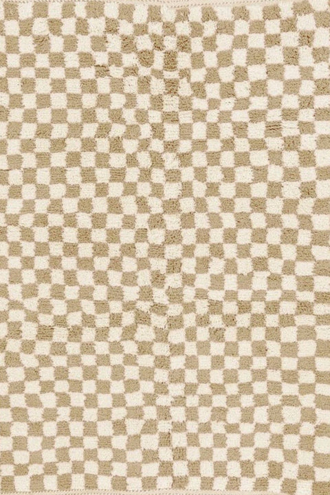 Close-up detail of the beige and white checkered Beni Ourain Moroccan rug.
