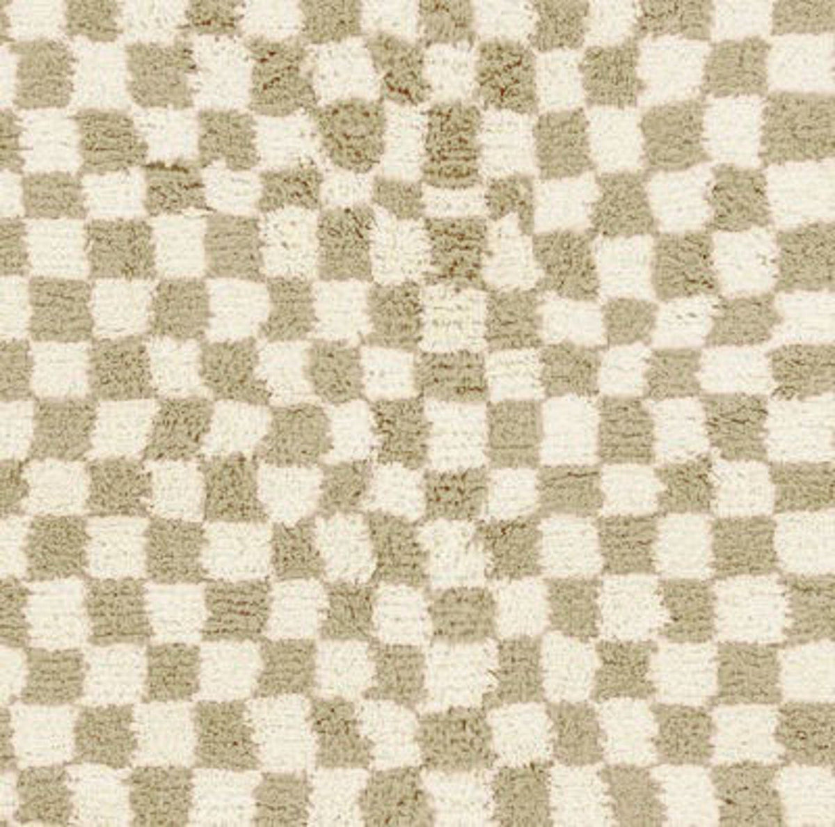 Close-up detail of the beige and white checkered Beni Ourain Moroccan rug.