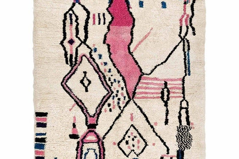 Front view of a multicolor tribal pattern Moroccan rug showcasing geometric patterns in cream, pink, and black.