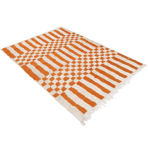 Front view of the orange Moroccan rug with a geometric design.