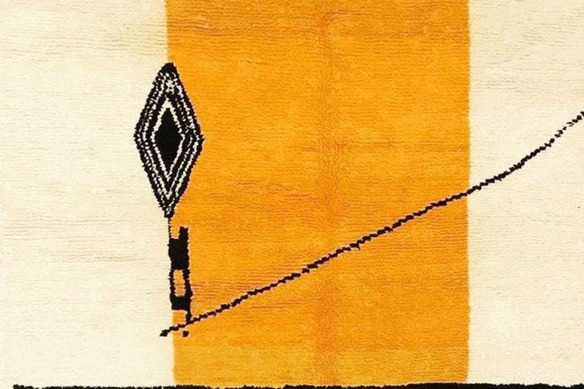 Detail close-up showcasing the abstract design and vibrant colors of the rug.