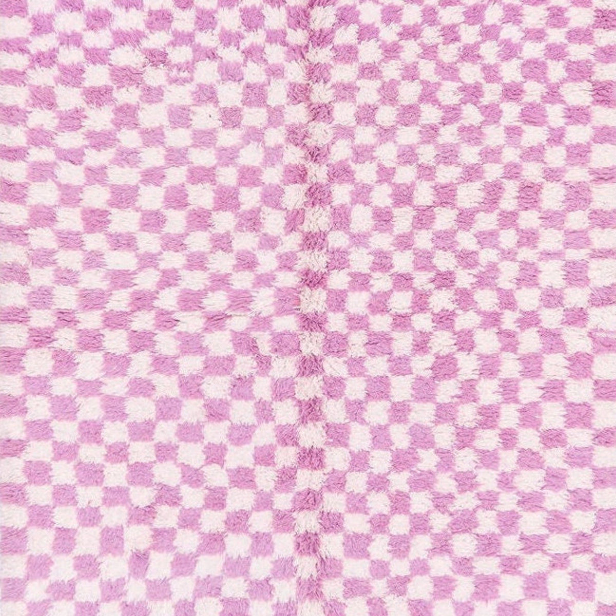 Side view of the pink checkered Beni Ourain Moroccan rug showcasing its abstract design.