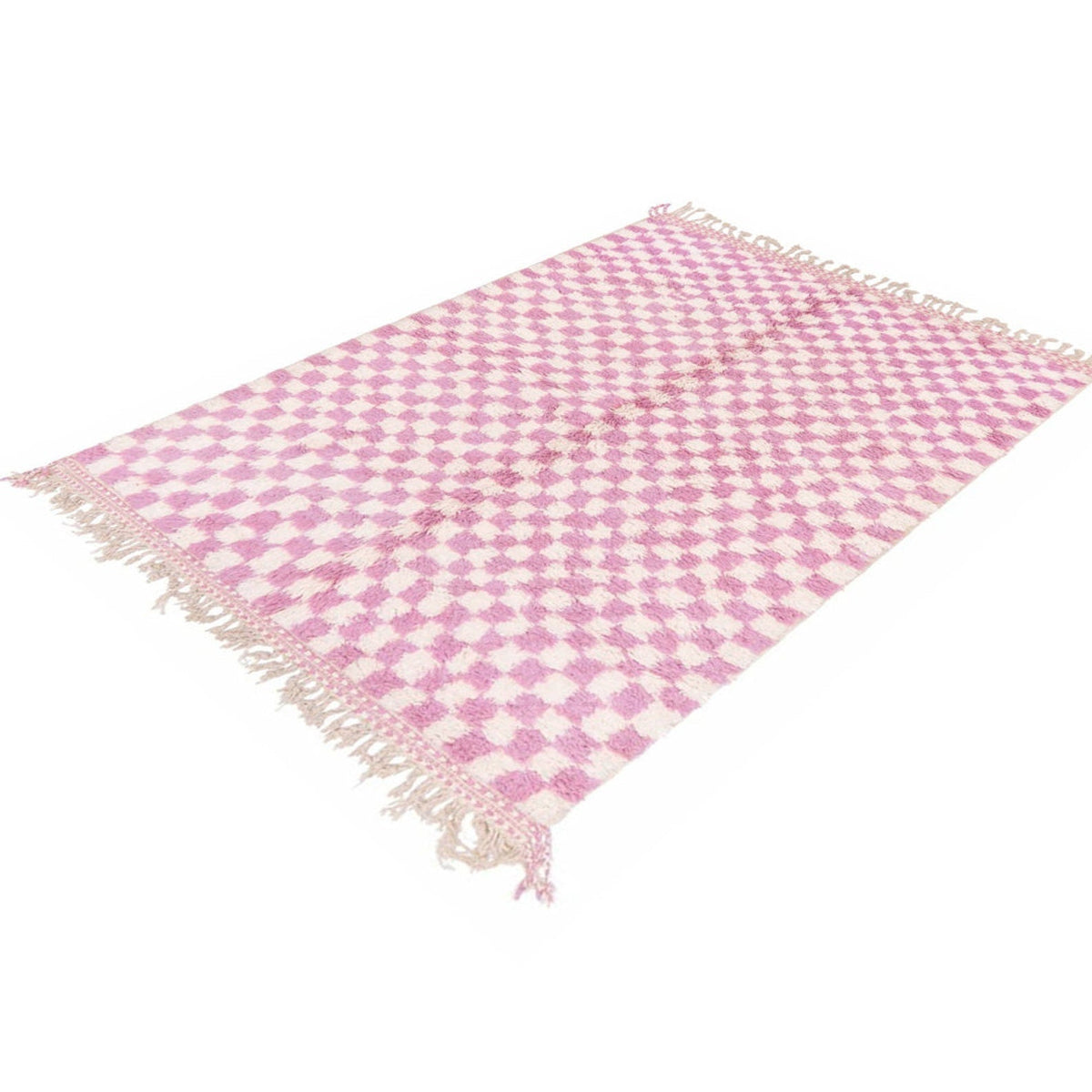Close-up detail of the pink checkered Beni Ourain Moroccan rug highlighting its abstract pattern.