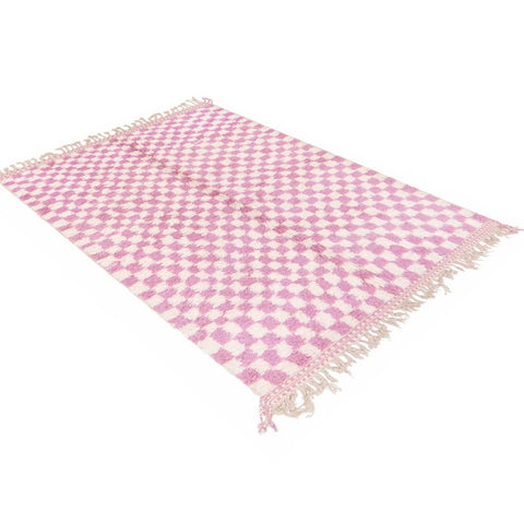 Lifestyle shot of the pink checkered Beni Ourain Moroccan rug in a room setting.