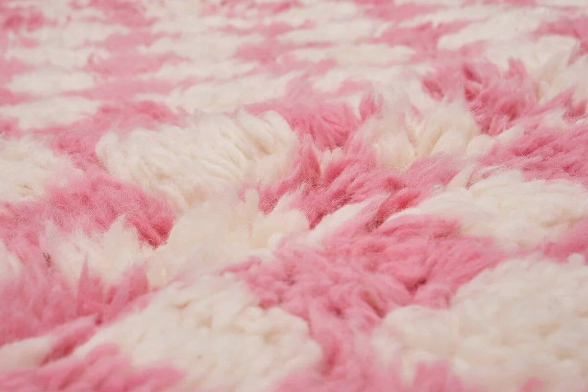 Front view of the pink checkered Beni Ourain rug highlighting its checkered pattern.