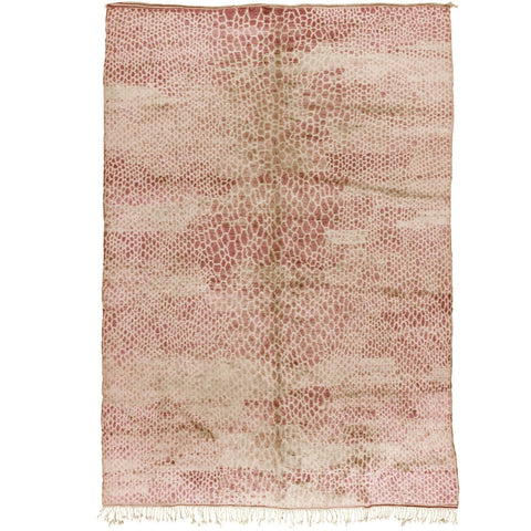 Front view of a dusty rose textured Moroccan rug with a pink and rust abstract pattern.