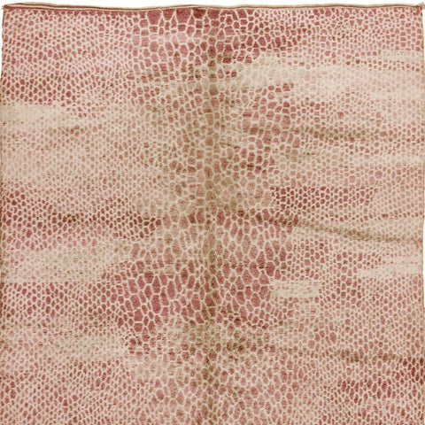 Front view of a dusty rose textured Moroccan rug showcasing an abstract pink and rust design.