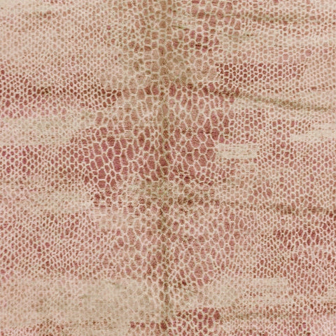 Front view of a dusty rose textured Moroccan rug featuring an abstract design in pink and rust tones.