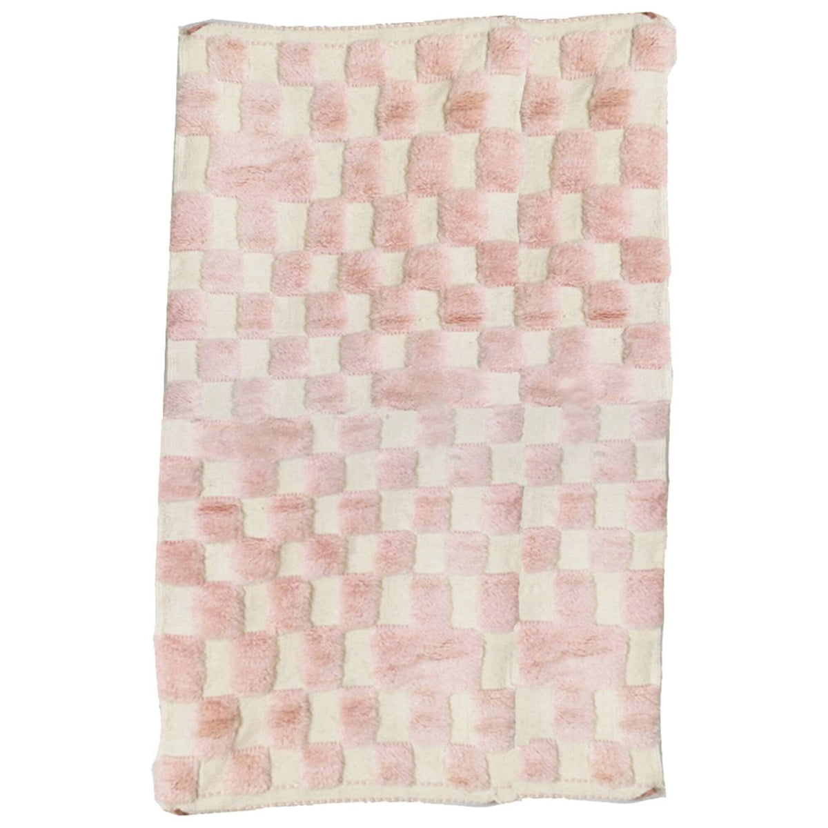 Front view of the pink Beni Ourain rug showcasing its textured abstract pattern.