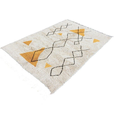 Another view emphasizing the geometric design in yellow and black on the Moroccan rug.