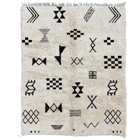Front view of a black and white Moroccan Tribal Custom Rug featuring tribal patterns against a solid background.