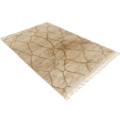 Close-up detail of the pink abstract Moroccan Berber rug highlighting its design and texture.