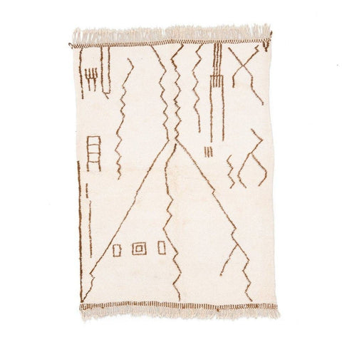 Front view of the off-white area rug featuring abstract geometric patterns.