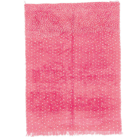 Front view of the pink Beni Ourain rug featuring white dots against a white background.