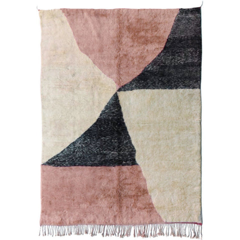 Front view of the pink Moroccan rug featuring a geometric pattern and fringe edges on a white background.