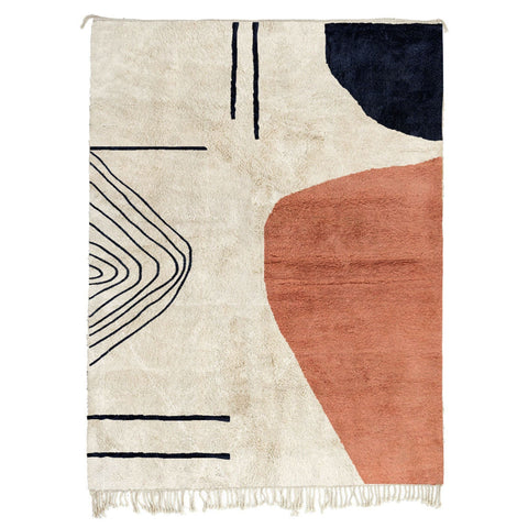 Front view of the coral and cream abstract Moroccan rug featuring geometric patterns.