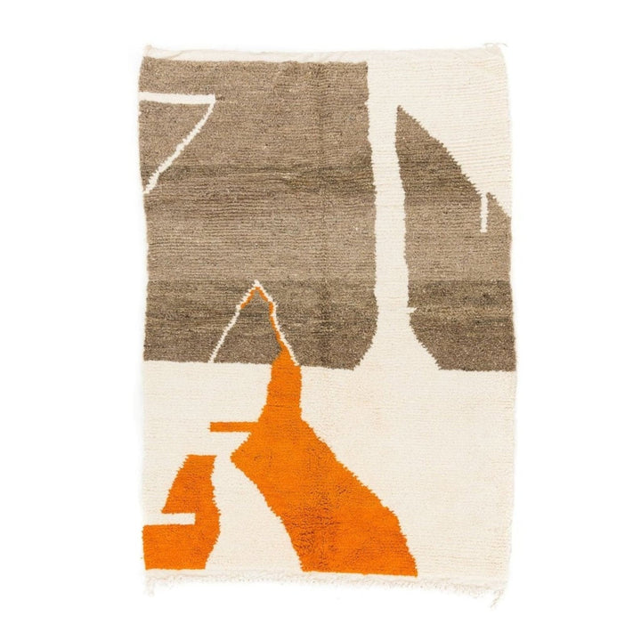 Front view of the orange and beige abstract Moroccan rug with geometric patterns.