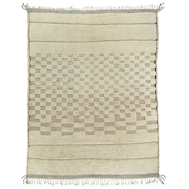 Detail shot of off-white textured Beni Ourain Moroccan rug with a patterned design.