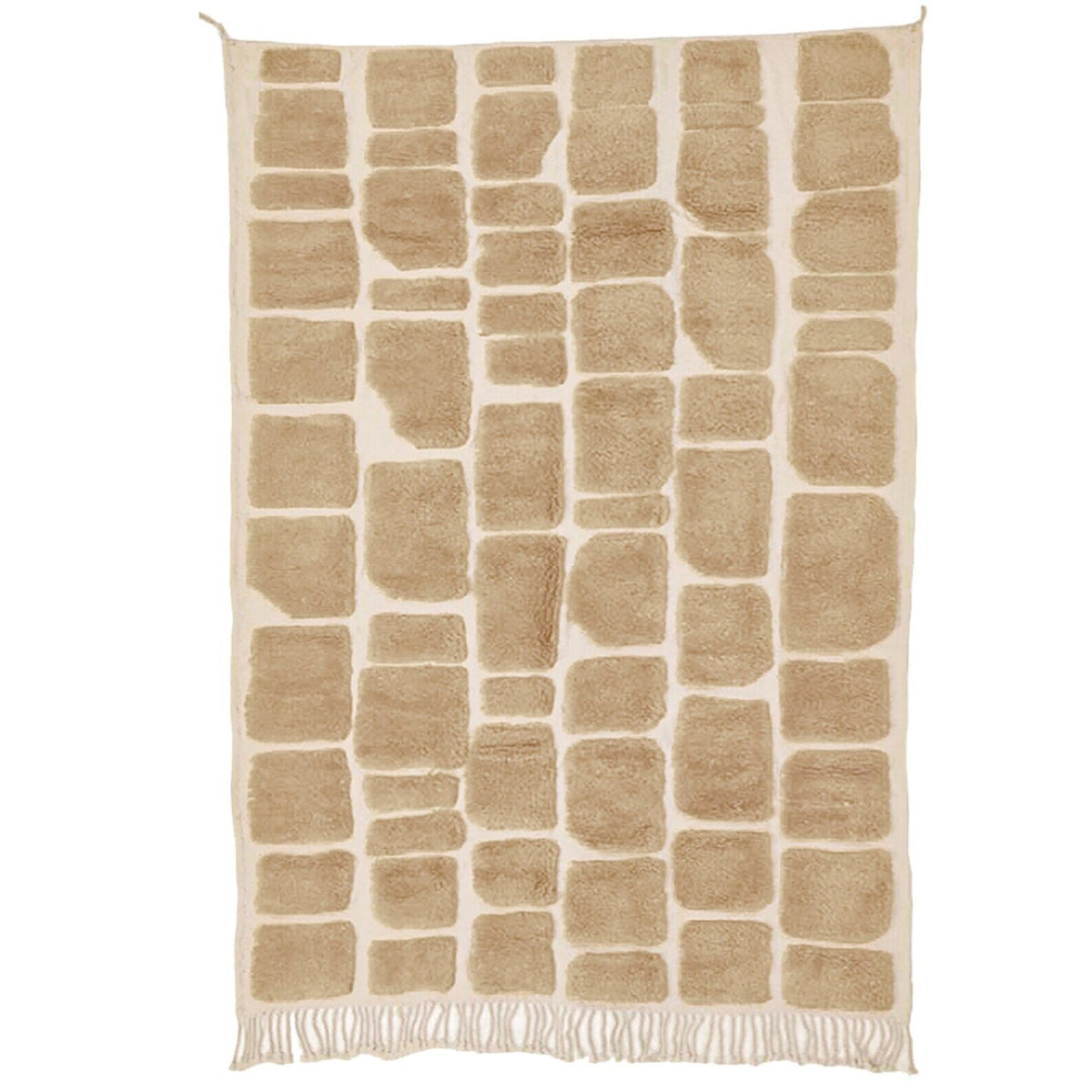 Lifestyle shot of a textured Moroccan rug in a natural setting, highlighting its geometric design.